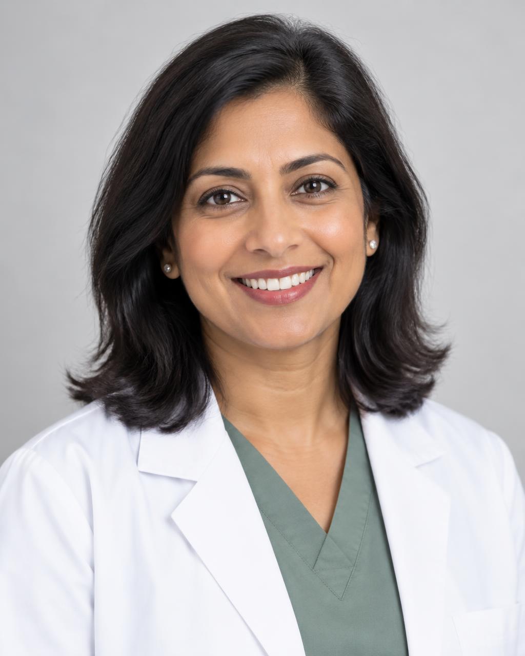 Illustrative female dentist model, not Dr. Mridula Arora